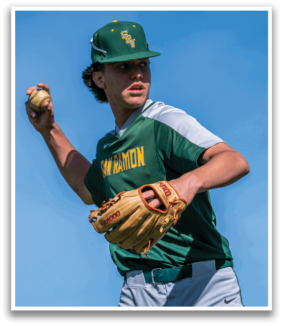 A baseball player wearing a green and white uniform. Description generated by AI