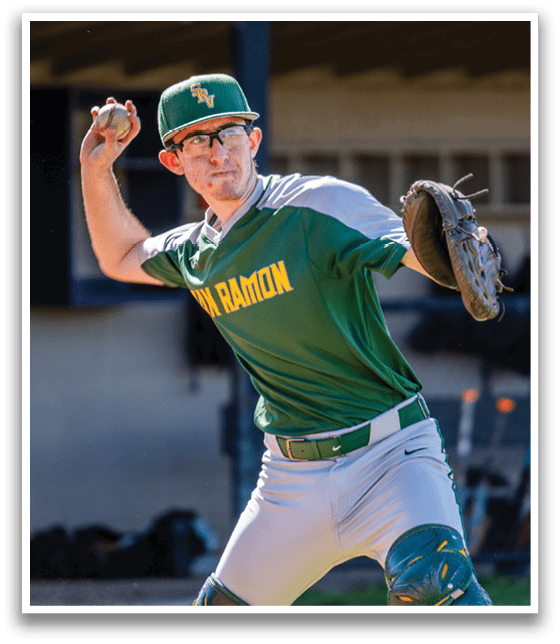 A baseball player wearing a green and white uniform. Description generated by AI