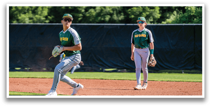 A baseball player with a glove on his hand. Description generated by AI