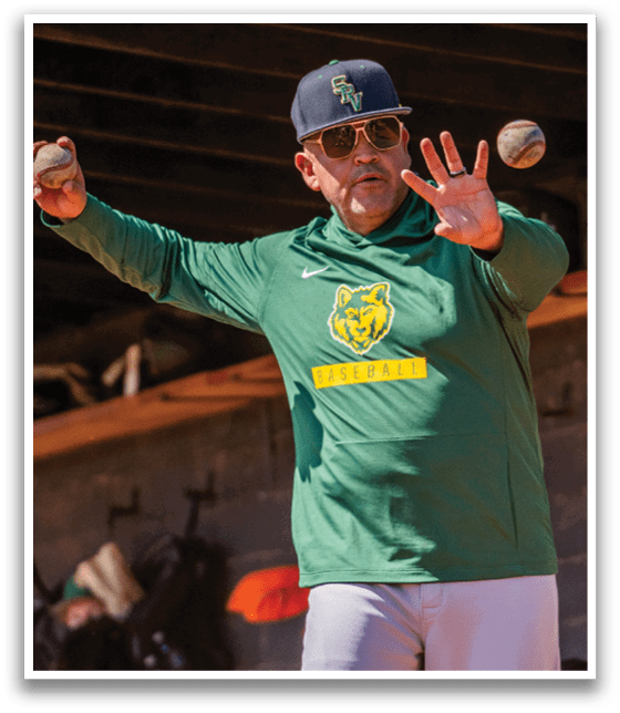A man wearing a green shirt and sunglasses is throwing a baseball. Description generated by AI