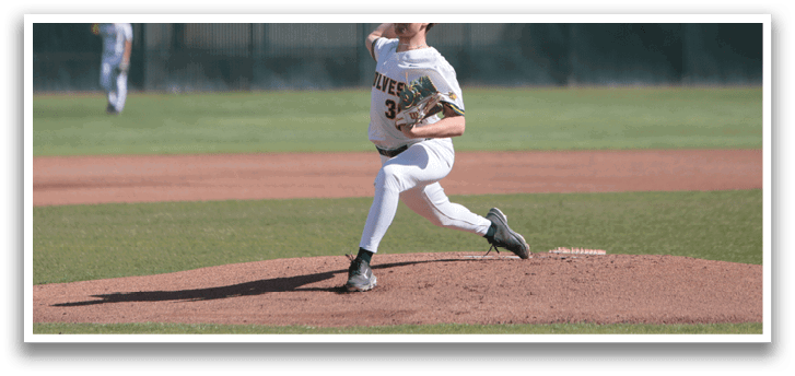 A baseball pitcher in a white uniform is throwing a pitch. Description generated by AI