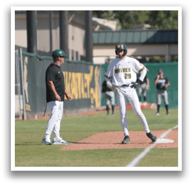 A baseball player is standing on home plate. Description generated by AI