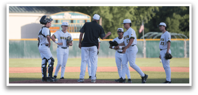 A group of baseball players on a field. Description generated by AI