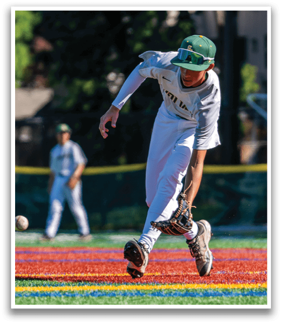 A baseball player is running towards a base. Description generated by AI