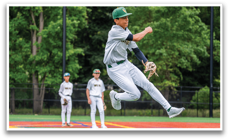 A baseball player jumps in the air to catch a ball. Description generated by AI