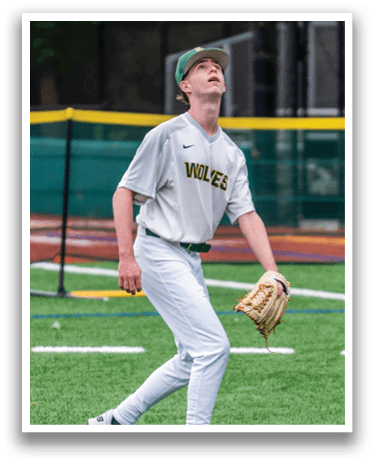 A baseball player wearing a grey and white uniform. Description generated by AI