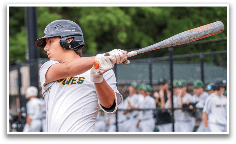 A baseball player in a white uniform is swinging a bat. Description generated by AI