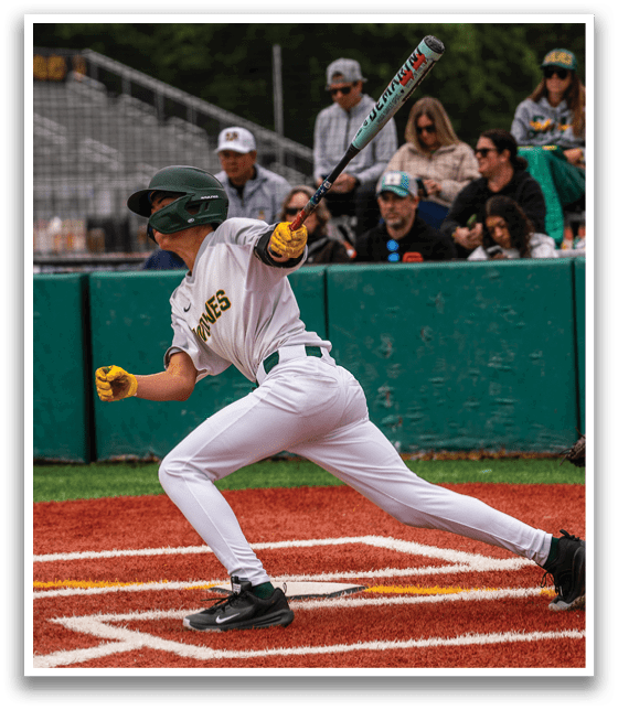 A baseball player is swinging a bat at a ball. Description generated by AI