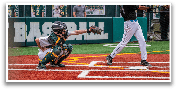 A baseball player is swinging a bat at a ball. Description generated by AI