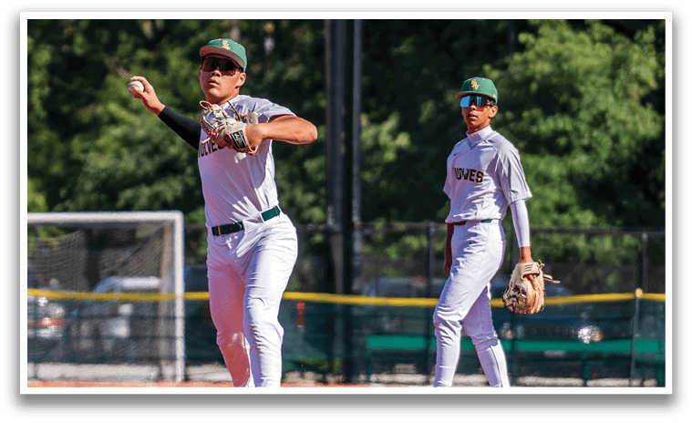 Two baseball players on a field. Description generated by AI