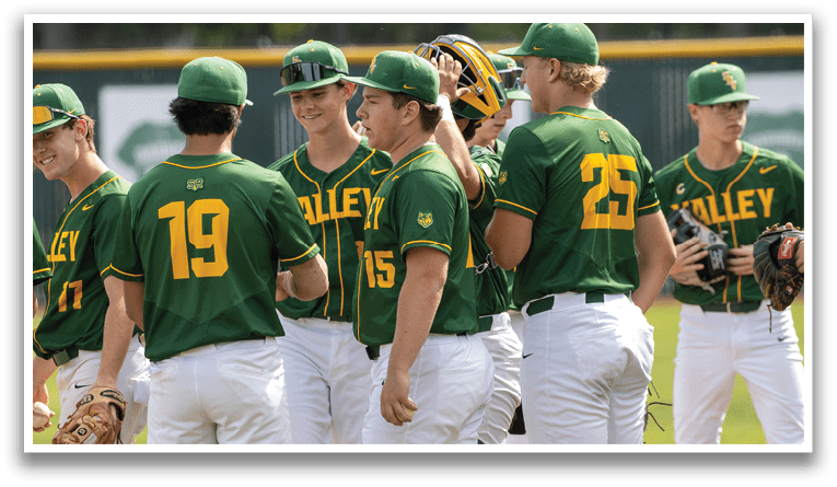 A group of baseball players wearing green and yellow uniforms. Description generated by AI