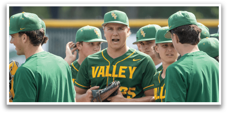 A group of baseball players wearing green and yellow uniforms. Description generated by AI