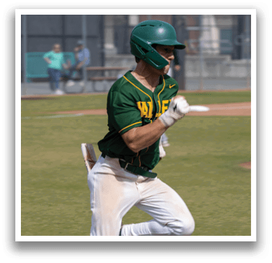 A baseball player running on the field. Description generated by AI