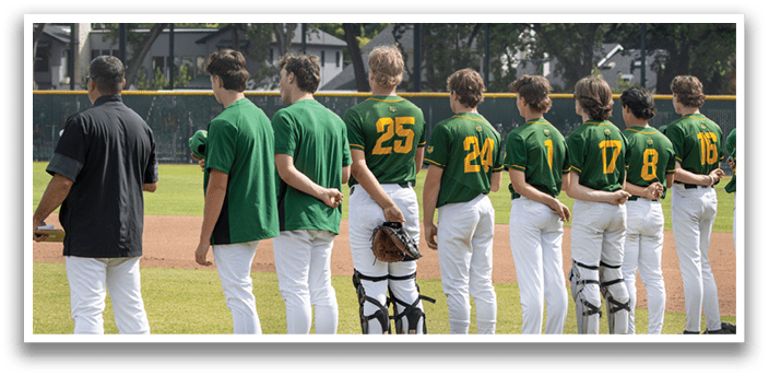 A group of baseball players standing on a field. Description generated by AI