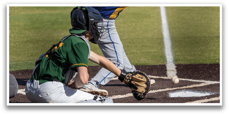 A baseball player is sliding into home plate. Description generated by AI