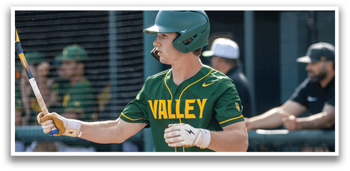 A baseball player wearing a green and yellow jersey. Description generated by AI