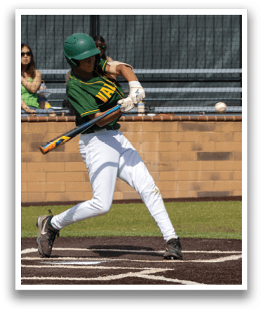 A baseball player in a green helmet and white uniform is swinging a bat. Description generated by AI