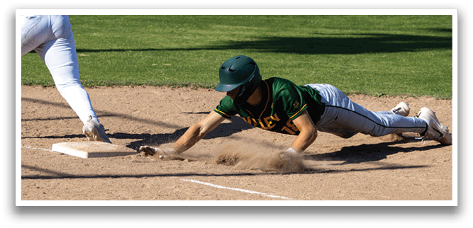 A baseball player slides into a base. Description generated by AI