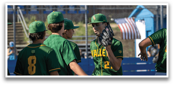 A group of baseball players wearing green and yellow uniforms. Description generated by AI