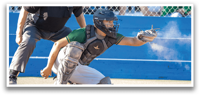 A baseball player is sliding into home plate. Description generated by AI
