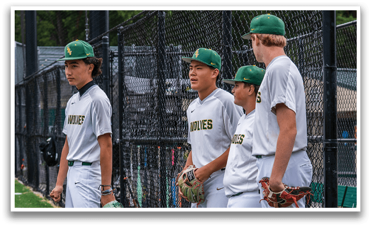 A group of young men wearing baseball uniforms and holding baseball gloves. Description generated by AI
