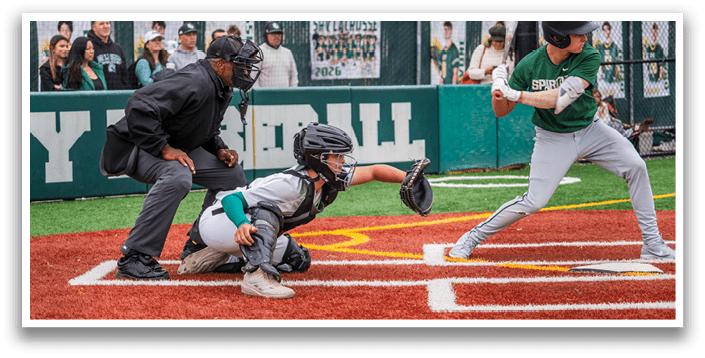 A baseball player is swinging a bat at a ball. Description generated by AI