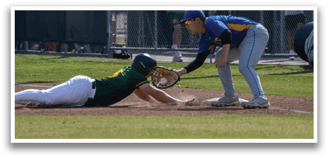 A baseball player sliding into a base. Description generated by AI