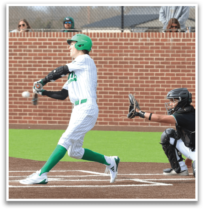 A baseball player is swinging a bat, attempting to hit a ball. Contenido generado con IA
