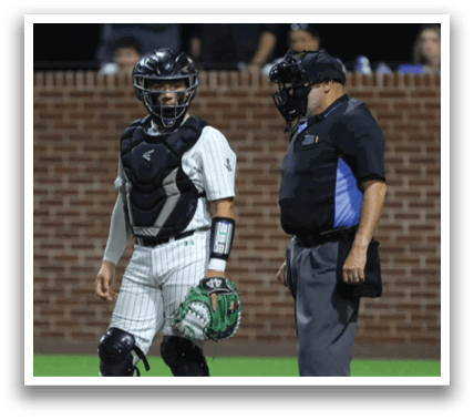 A baseball player is swinging a bat, while a catcher and an umpire watch from behind him. Contenido generado con IA