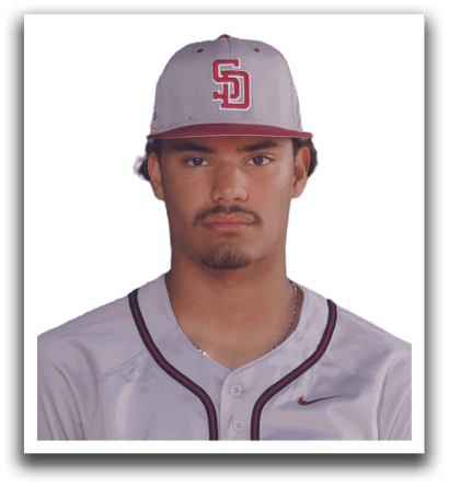 A man wearing a baseball cap with the letters S and D on it. Description generated by AI