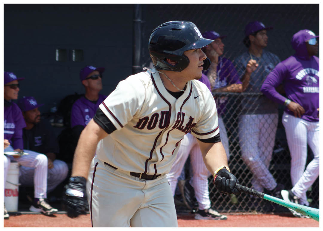 A baseball player running to first base. Description generated by AI