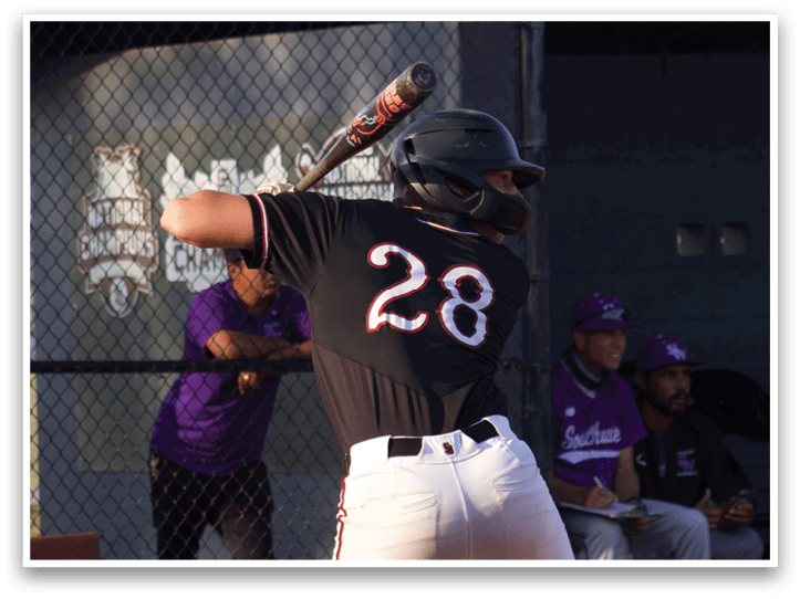 A baseball player is swinging a bat. Description generated by AI