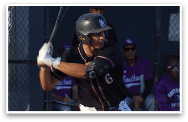 A baseball player is swinging a bat at a ball. Description generated by AI