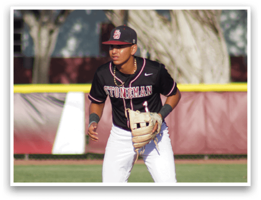 A baseball player wearing a black and white uniform. Description generated by AI
