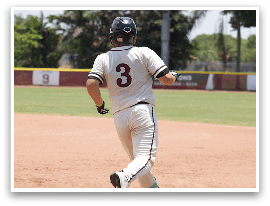 A baseball player wearing a white uniform with the number 3 on the back. Description generated by AI