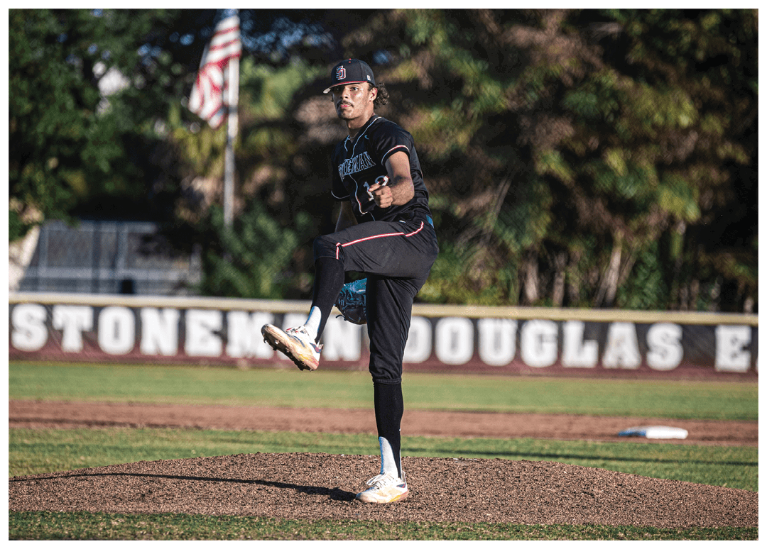 A baseball player in a black shirt and hat is pitching a ball. Description generated by AI