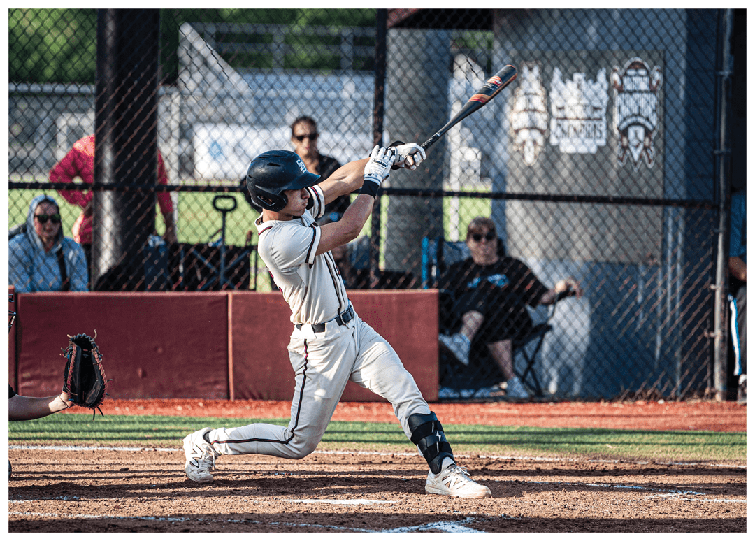 A baseball player is swinging a bat. Description generated by AI