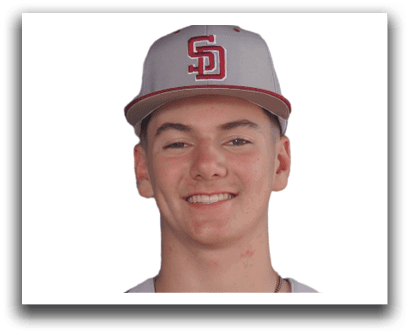A young man wearing a baseball uniform and a hat with the letter S on it. Description generated by AI