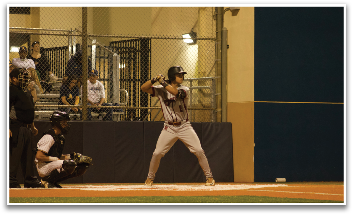 A baseball player is holding a bat, preparing to swing at a pitch. AI generated content