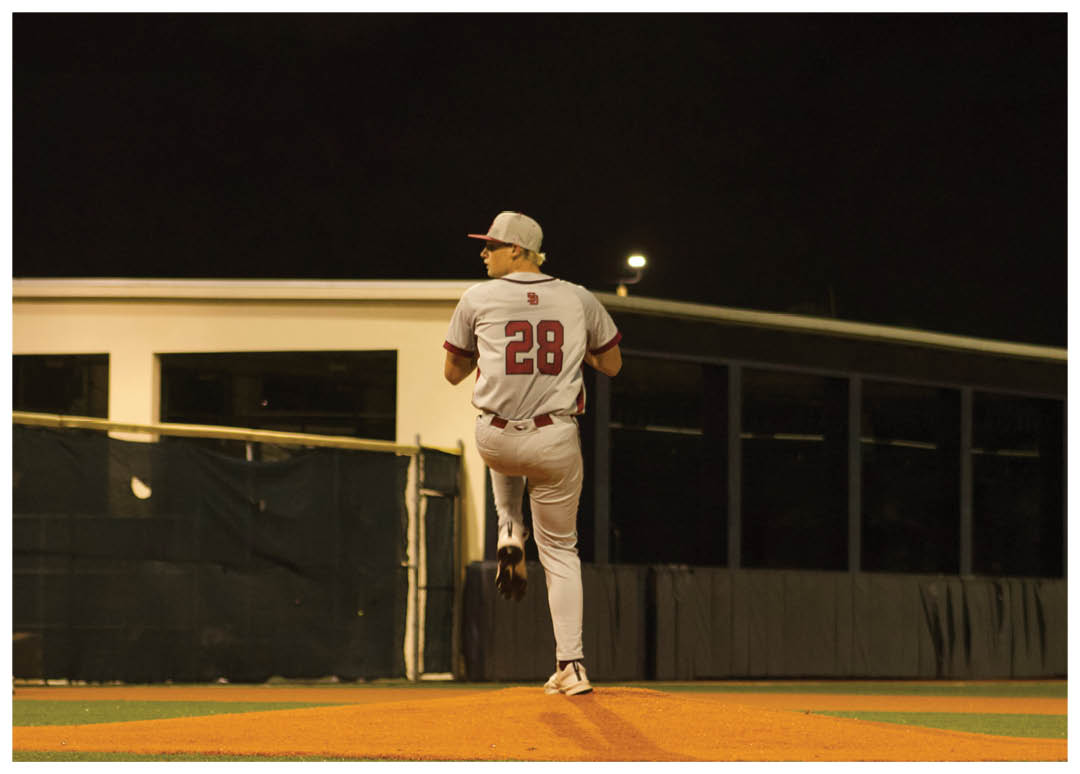 A baseball player is pitching a ball on a field. AI generated content