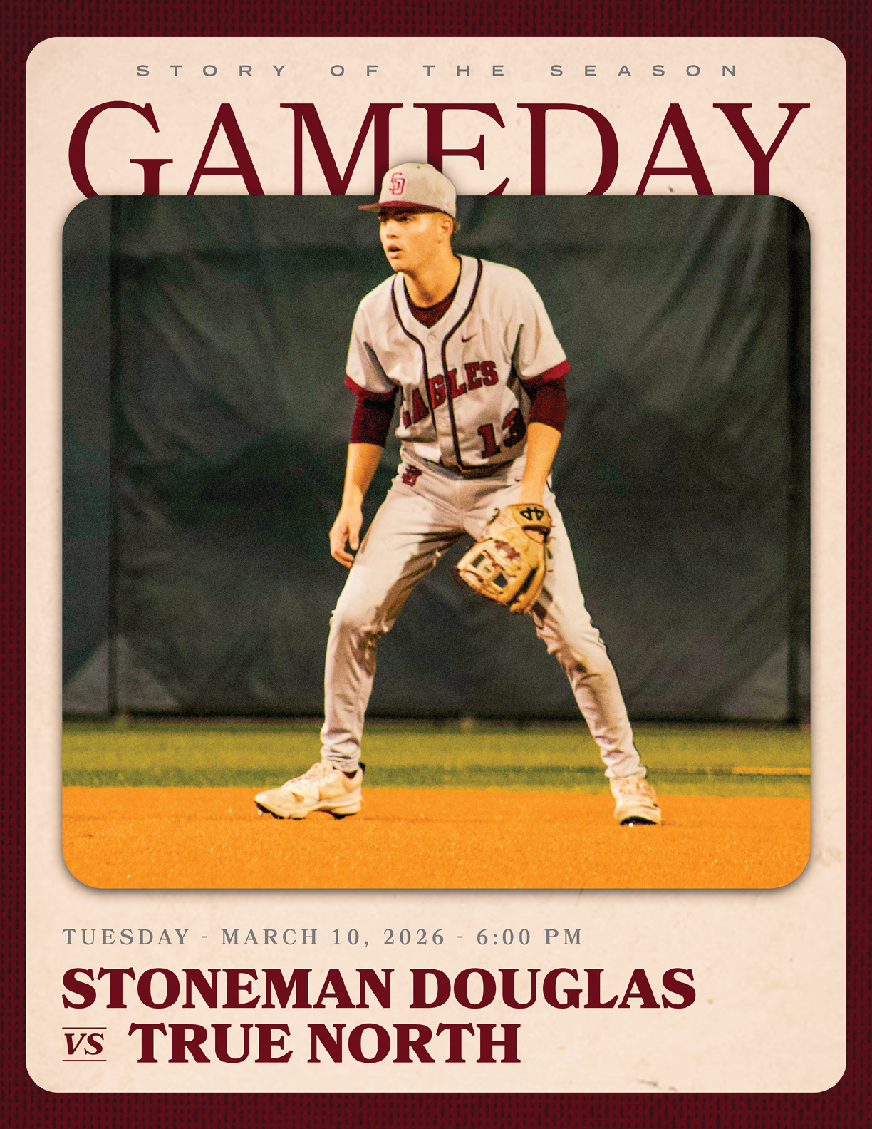 A baseball player in a grey and red uniform stands on a field. AI generated content