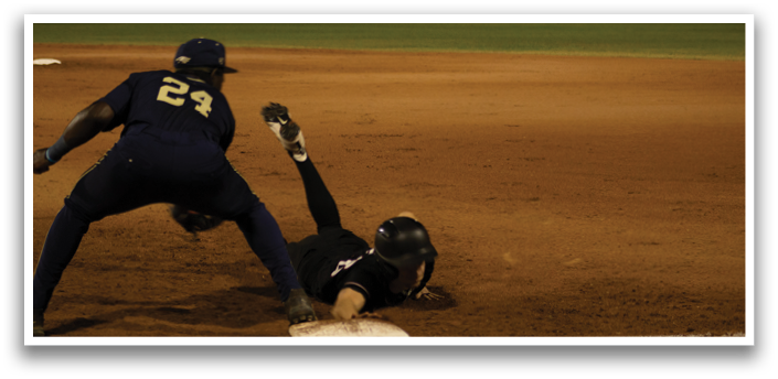 A baseball player in a black shirt and hat is pitching a ball on a field. AI generated content
