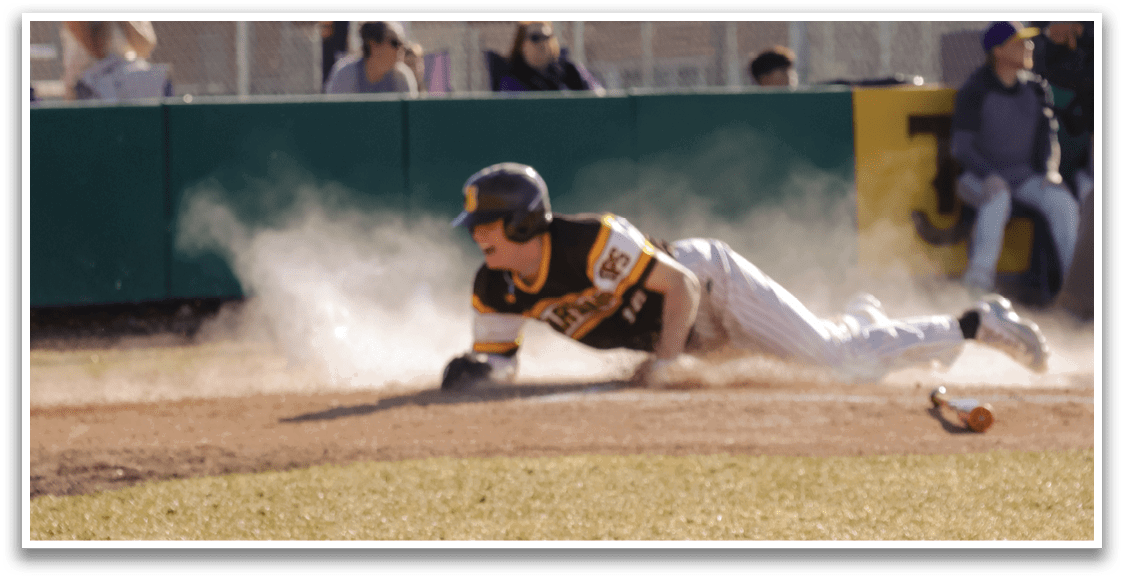 A baseball player slides into a base, kicking up dust. AI generated content