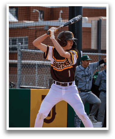 A baseball player in a brown and yellow uniform is holding a bat, getting ready to swing. AI generated content