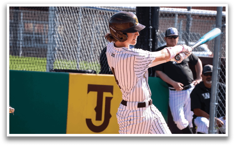 A baseball player in a white uniform is swinging a bat at a ball. AI generated content