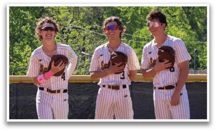 Three baseball players standing on a field, holding baseball gloves. AI generated content