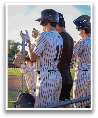 Baseball players in uniforms are standing on a field, some of them wearing helmets. AI generated content