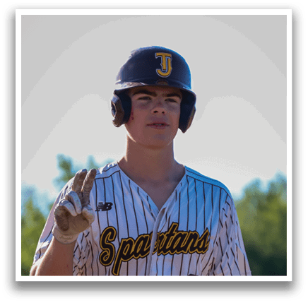 A baseball player wearing a striped uniform and a helmet stands on a field. AI generated content