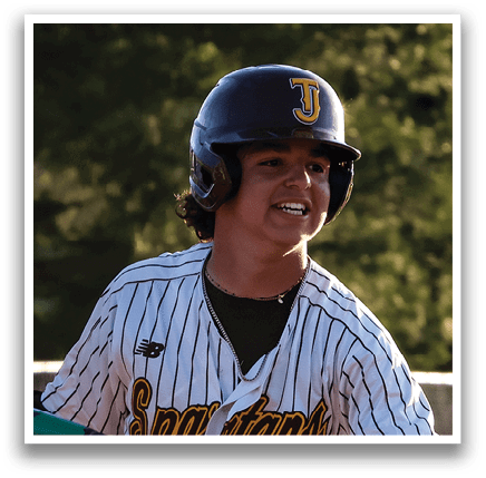 A baseball player in a white uniform is swinging a bat, preparing to hit the ball. AI generated content