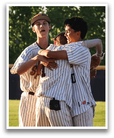 Three baseball players hugging each other on the field. AI generated content